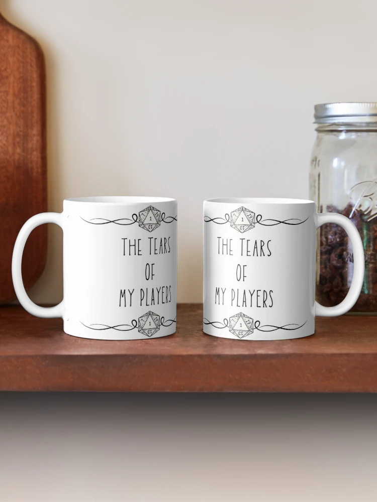 Show your Dungeon Master pride with the "The Tears Of My Players" Dungeon Master Coffee Cup! Perfect for tabletop RPG fans, this mug captures the chaotic fun of being a DM. - www.lacoo.eu
